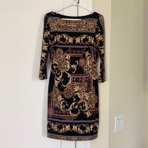 Cache dress. Size 10. Metallic accents, 34”L. Flattering darts, good stretch.